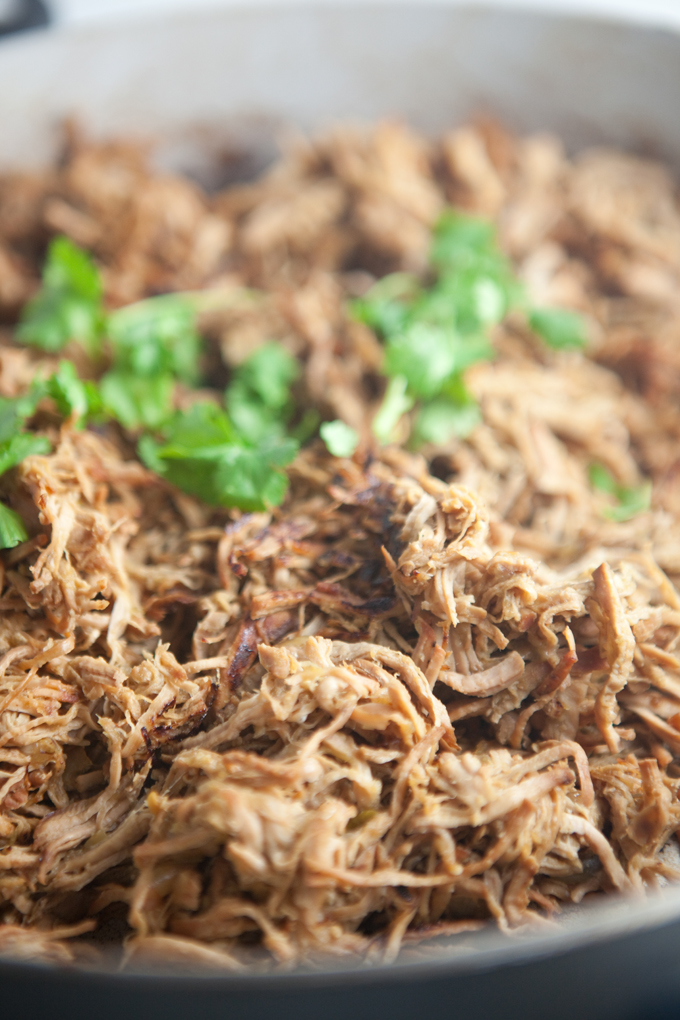 Easiest Slow Cooker Crispy Carnitas- So macro-friendly. Super low fat, high protein, and good in everything! www.lillieeatsandtells.com