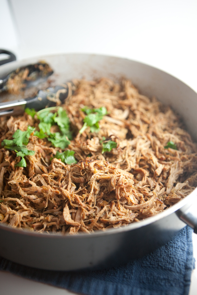 Easiest Slow Cooker Crispy Carnitas- So macro-friendly. Super low fat, high protein, and good in everything! www.lillieeatsandtells.com