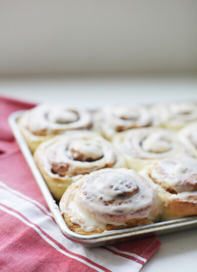 Cinnamon rolls baked in 9x13 pan and topped with glaze.