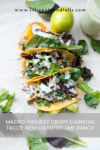 Three crispy carnitas tacos filled with tender pork, greens, and radishes, topped with creamy cilantro lime ranch, sit on a white surface with scattered greens, a lime, and a jar of dressing. Text appears above and below the tacos.