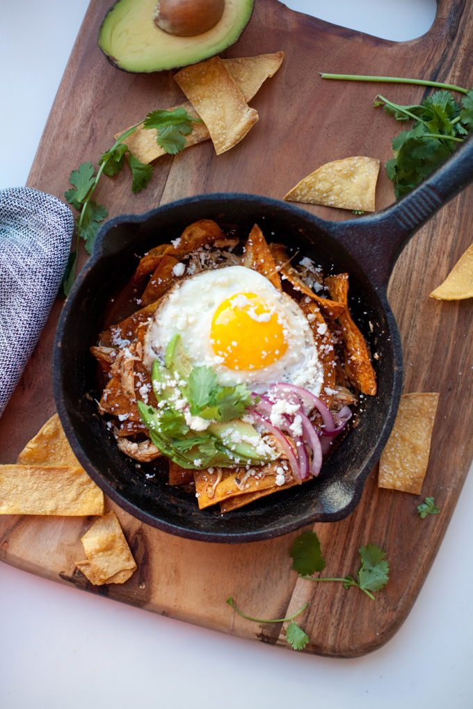 5-minute skinny chilaquiles in small cast iron skillet with toppings.