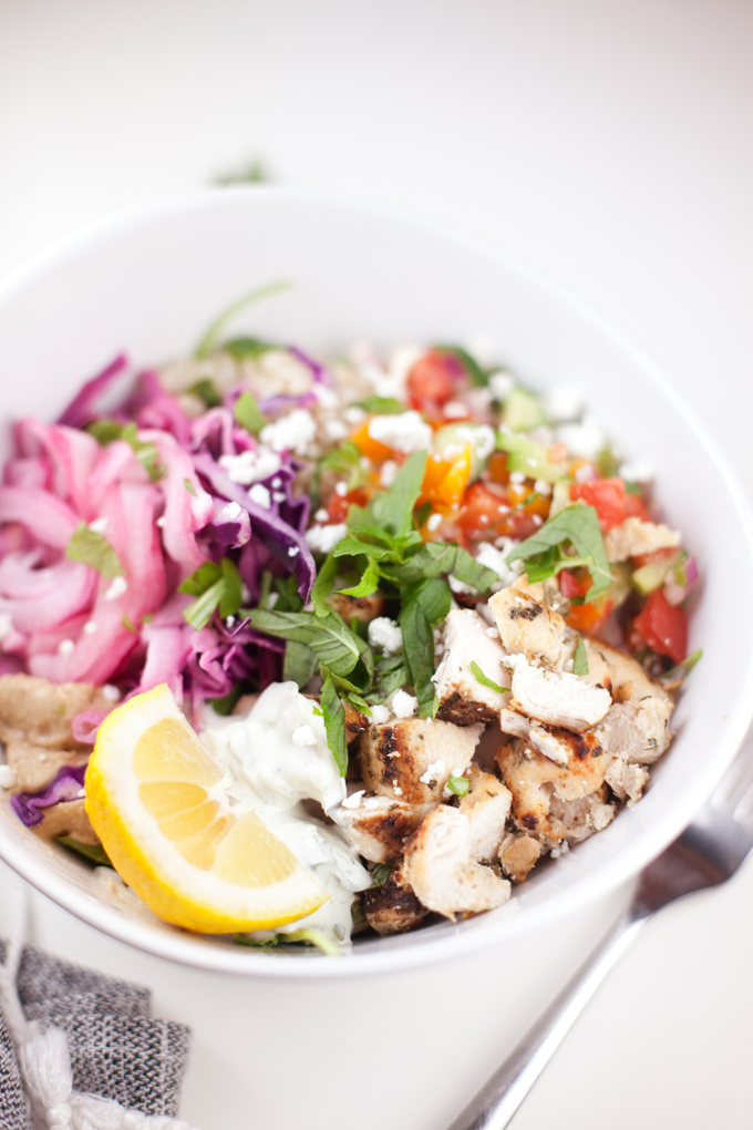 Copycat cava grain bowl in white bowl with fork on the side.