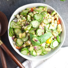 Perfect for a barbecue! One of my favorite non-leafy side salads. Cucumber Corn Summer Salad #macrofriendly #healthy #cookinglight www.lillieeatsandtells.com