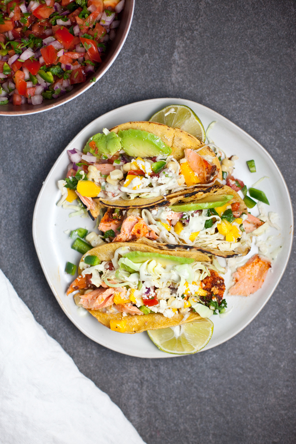 Blackened Salmon Tacos with all the toppings lillieeatsandtells.com