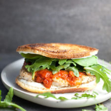 chicken parmesan sandwich on a gray plate