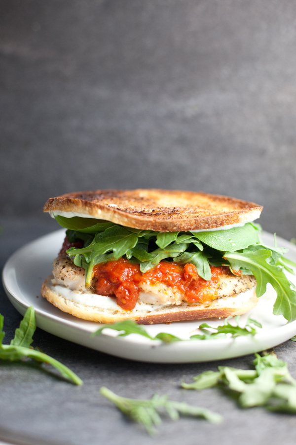chicken parmesan sandwich on a gray plate