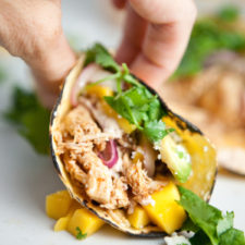 Instant pot chipotle chicken piled in tacos