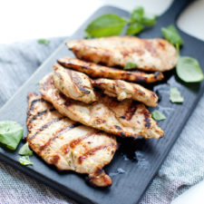 Grilled chicken on cutting board