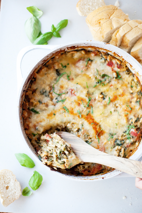Taking a scoop of cheesy spaghetti squash bake.