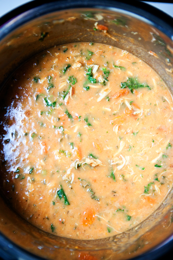 Instant pot full of creamy tomato chicken soup