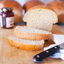 sliced loaf of homemade wheat bread