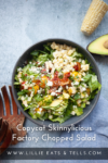 A bowl of chopped salad with avocado, corn, tomatoes, cheese, and lettuce sits on a gray surface. A wooden salad fork, half an avocado, and a piece of corn are beside the bowl. Text reads: Copycat Factory Chopped Salad—bring the fresh flavors of your favorite restaurant right to your table.