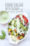 bowl of cobb salad with text