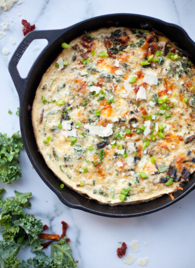 Turkey mushroom spaghetti squash quiche baked in large cast-iron skillet.