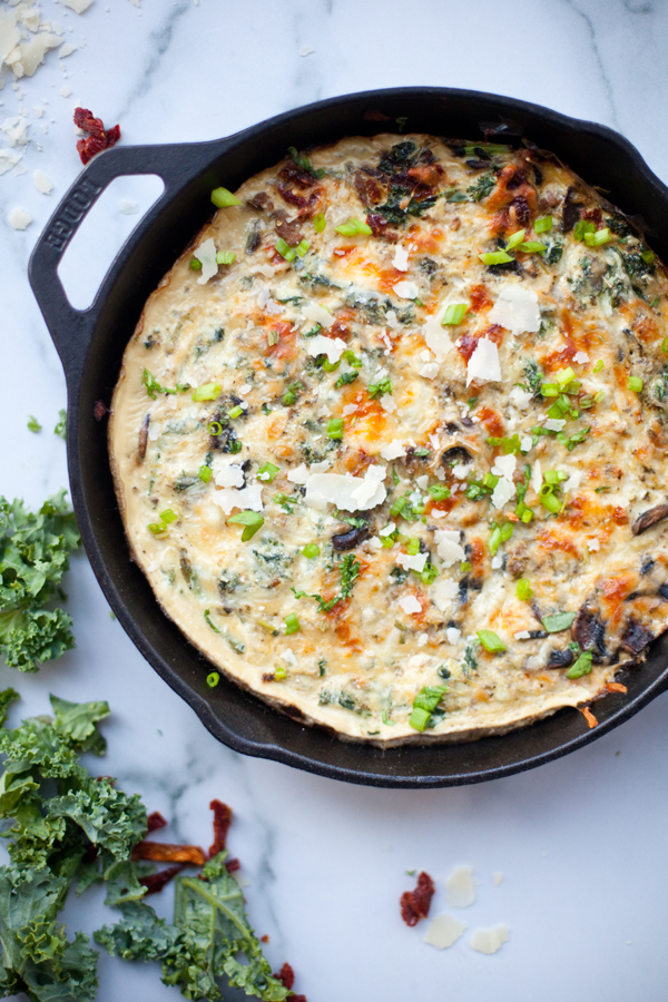 Turkey mushroom spaghetti squash quiche baked in large cast-iron skillet.
