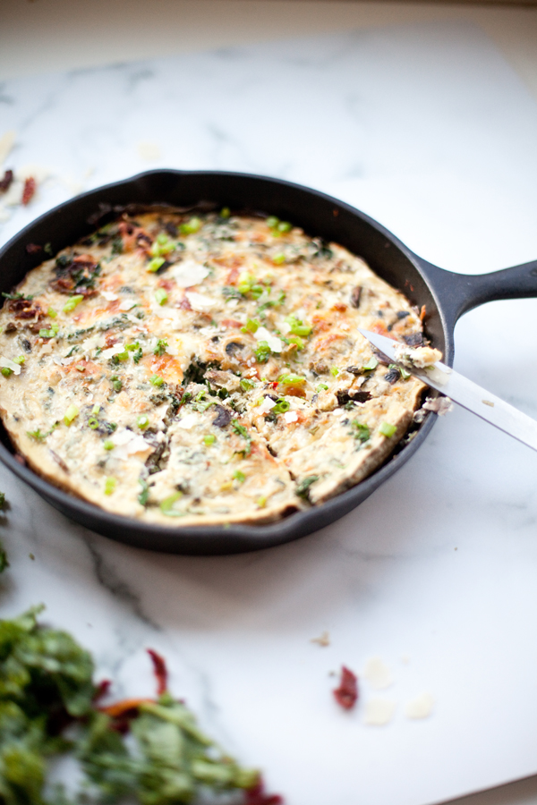 Turkey mushroom spaghetti squash quiche baked in cast-iron then sliced.