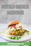 Enjoy an Easy Buffalo Chicken Sandwich featuring shredded chicken, pickled onions, cabbage, jalapeños, and cilantro on a fresh bun, beautifully served on a white plate. Text reads: Buffalo Chicken Sandwich and www.lillieeatsandtells.com.