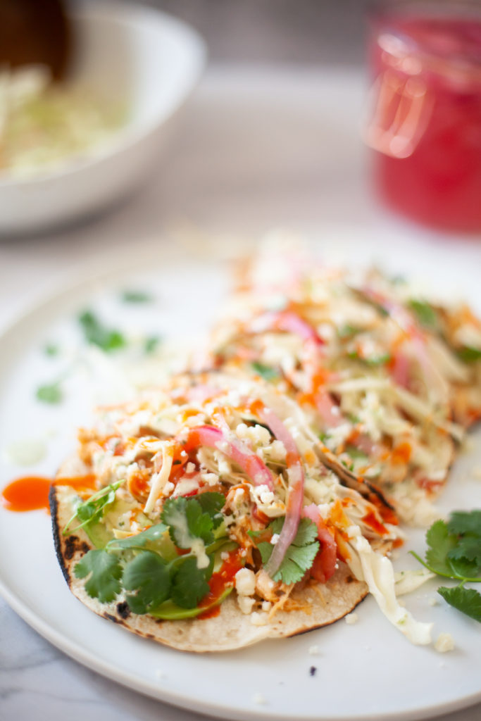 Try this super fun and easy recipe of buffalo chicken tacos. www.lillieeatsandtells.com