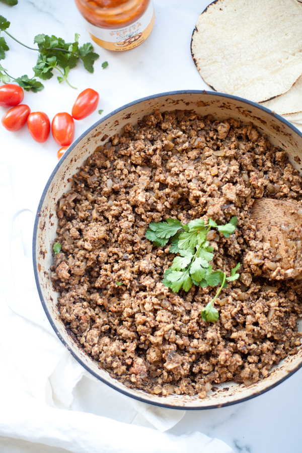 This mushroom turkey taco meat is great by itself or on a tortilla with your favorite toppings. www.lillieeatsandtells.com