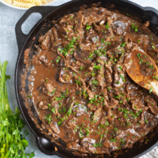 Beef stroganoff in a cast iron skillet.