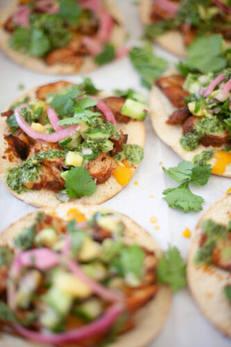 Try these macro-friendly tostadas with pineapple salsa and chimichurri sauce. www.lillieeatsandtells.com