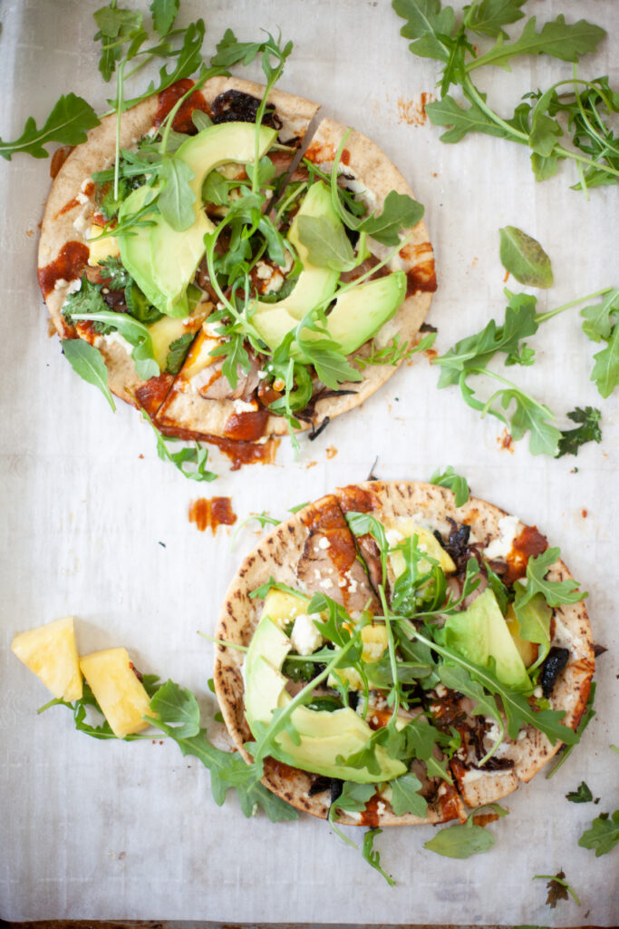cooked and fresh vegetables covered with bbq sauce on flatbread. www.lillieeatsandtells.com