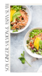 Two white bowls filled with soy ginger salmon, sliced avocado, mango, edamame, and colorful Asian slaw are shown on a light surface. Text on the left reads “Soy Ginger Salmon & Asian Slaw,” highlighting the vibrant flavors of soy ginger salmon and Asian slaw in this fresh and delicious dish.