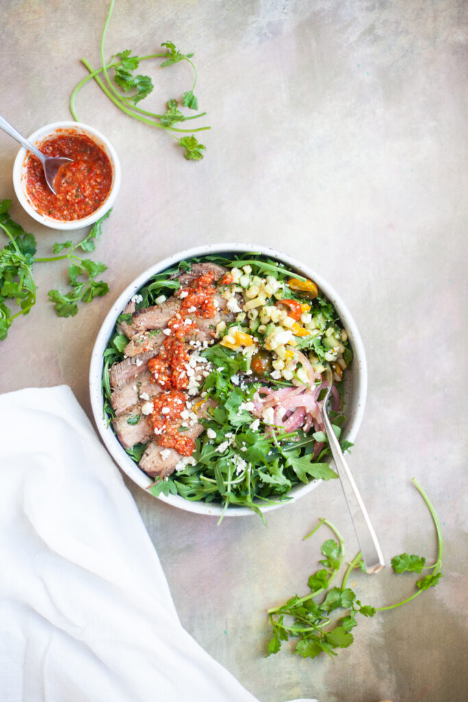 My favorite Steak and Arugula Salad with Romesco Sauce www.lillieeatsandtells.com