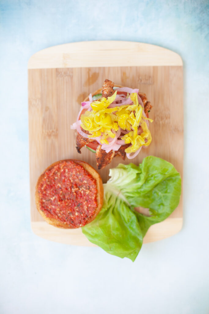 blackened chicken sandwich with romesco sauce from www.lillieeatsandtells.com