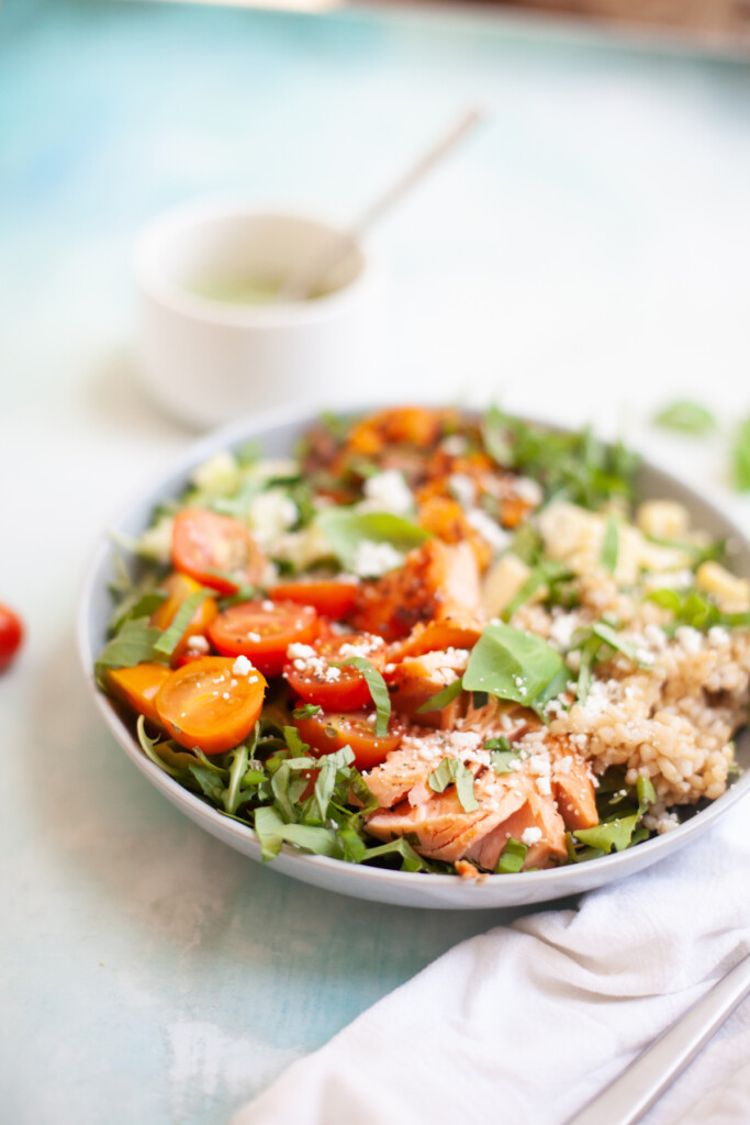 This salad comes together really quickly if you already have your salmon and sweet potatoes made. www.lillieeatsandtells.com