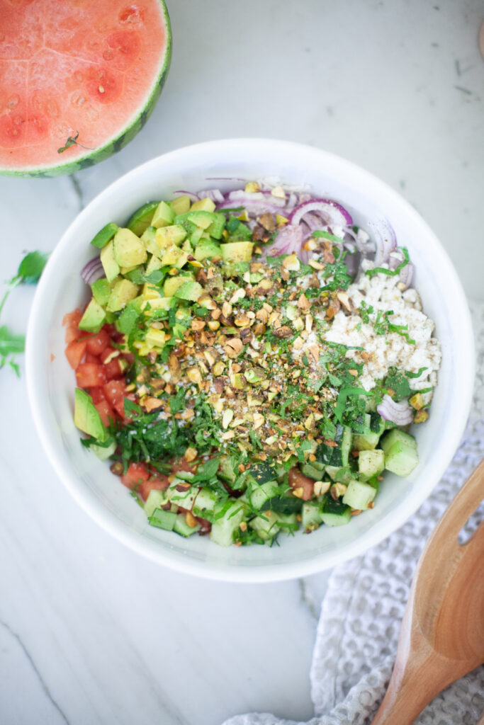 watermelon cucumber feta salad with pistachios from www.lillieeatsandtells.com