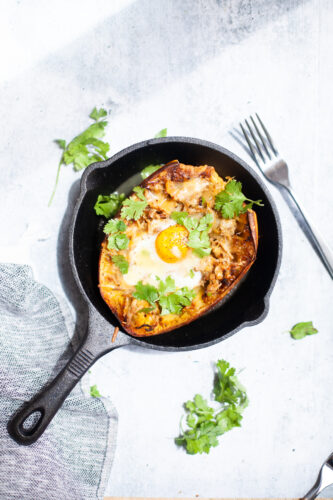 www.lillieeatsandtells.com recipe for pulled pork spaghetti squash boats with a fried egg
