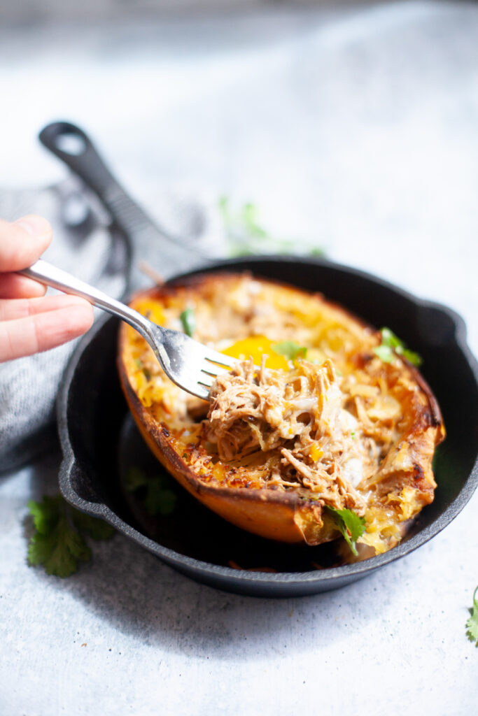 www.lillieeatsandtells.com recipe for pulled pork spaghetti squash boats with a fried egg