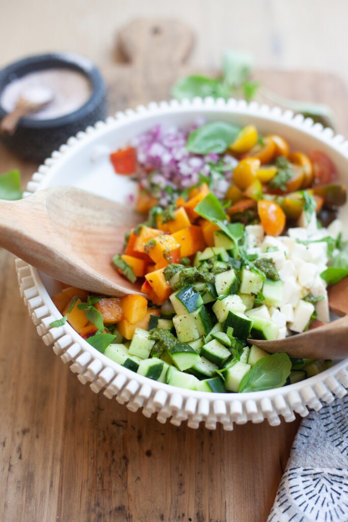 baker and olive white balsamic vinegar served on a peach chopped caprese salad by www.lillieeatsandtells.com