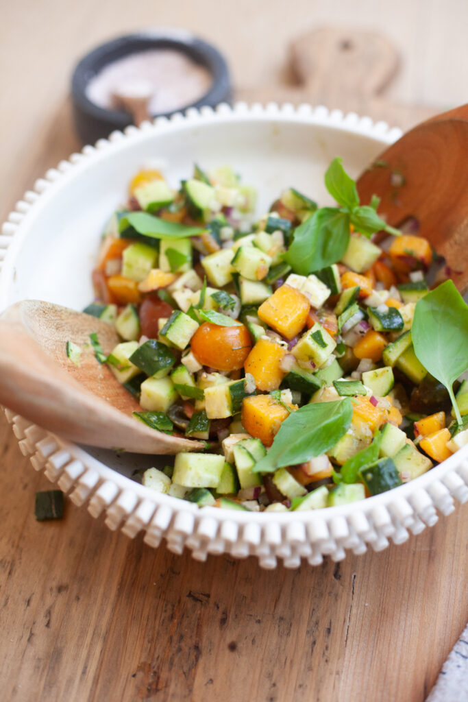 baker and olive white balsamic vinegar served on a peach chopped caprese salad by www.lillieeatsandtells.com