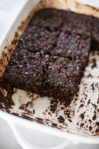 Half a pan of brownie batter squash oats in 9x13 pan.
