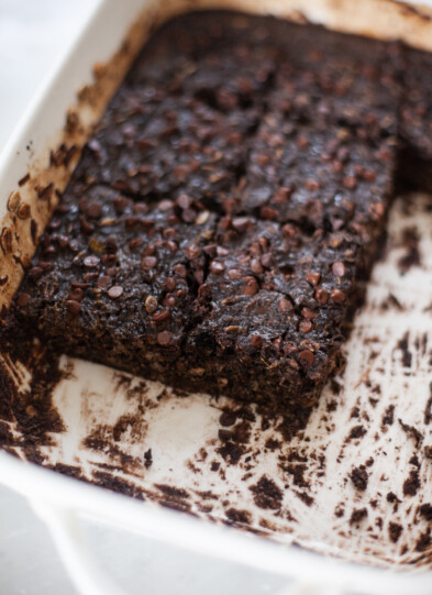 Half a pan of brownie batter squash oats in 9x13 pan.