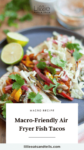 Air fryer fish tacos with cabbage and a side of lime with text overlay, "Macro-Friendly Air Fryer Fish Tacos."