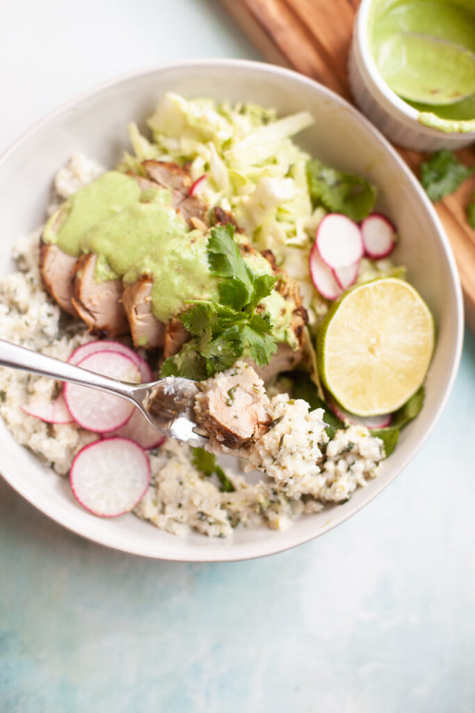 Coconut Cilantro Sticky Cauliflower Rice served with Pineapple Cilantro Pork Tenderloin by www.lillieeatsandtells.com