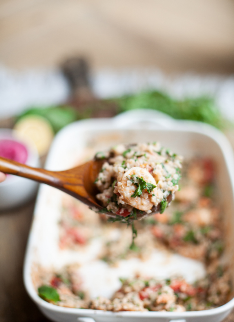 Healthy food can be delicious. This baked feta cauliflower rice with shrimp dish is perfect for anyone counting macros. www.lillieeatsandtells.com
