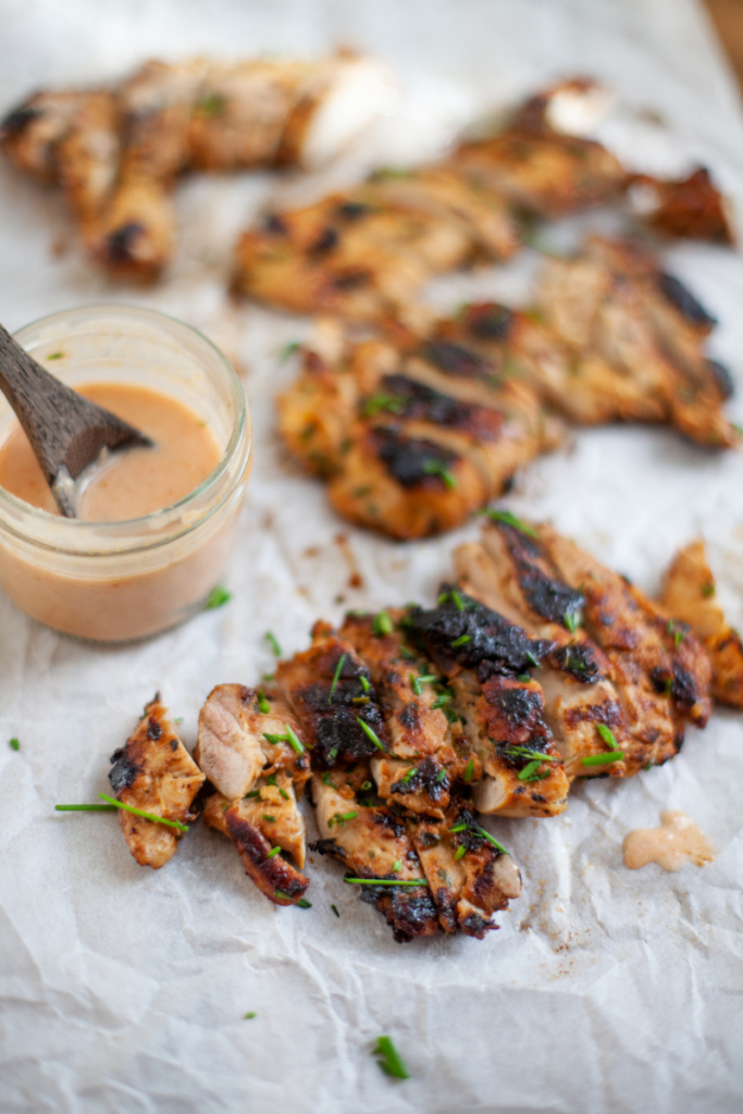 Top your salad with this macro-friendly spicy peanut ginger vinaigrette. www.lillieeatsandtells.com
