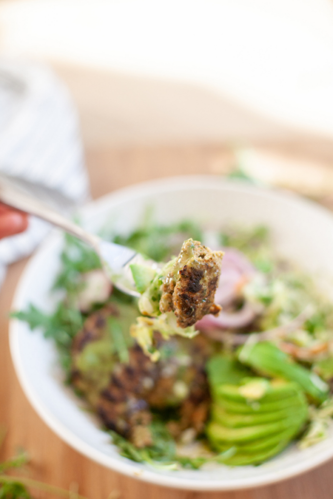 This macro-friendly recipe is for a Green Goddess slaw piled high and topped with a perfectly crispy turkey burger. www.lillieeatsandtells.com