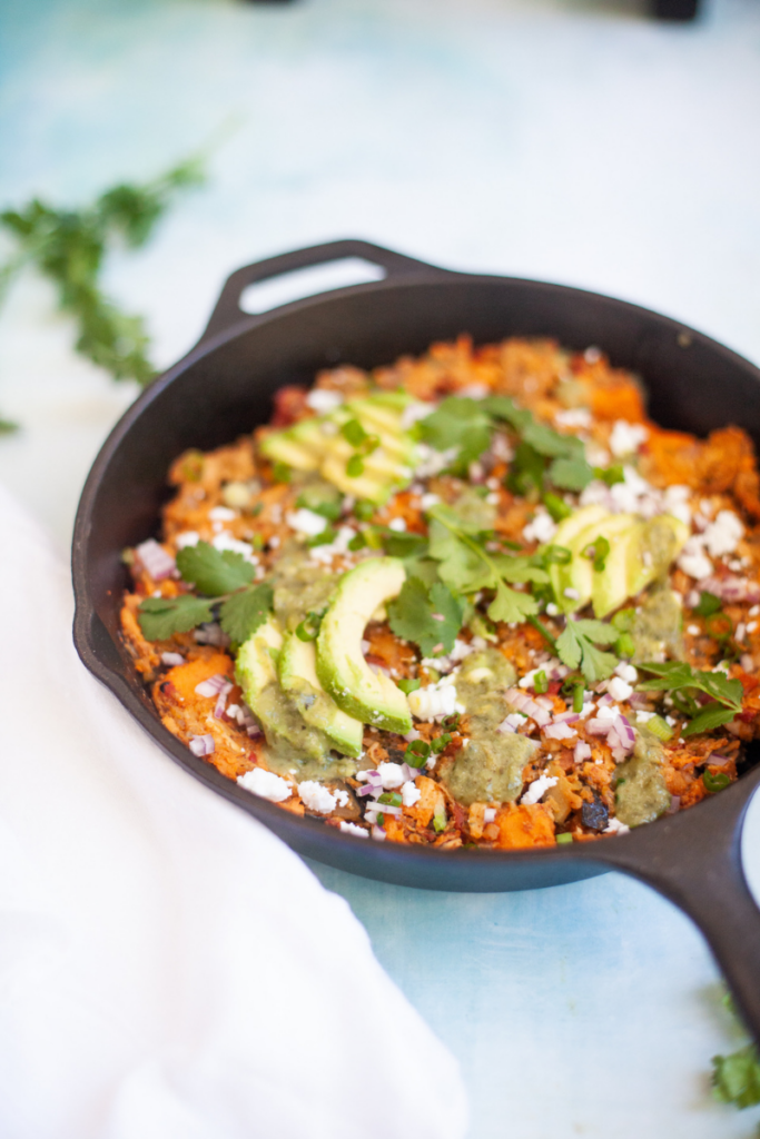 You can't miss out on this healthy sweet potato chipotle rotisserie chicken skillet. www.lillieeatsandtells.com