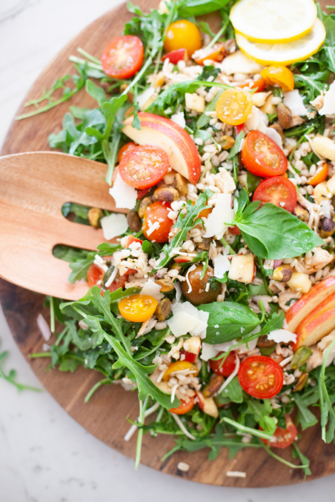 Toss up this macro-friendly arugula barley salad with lemon and parmesan. www.lillieeatsandtells.com