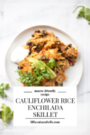 This macro-friendly cauliflower rice enchilada skillet is so comforting. www.lillieeatsandtells.com