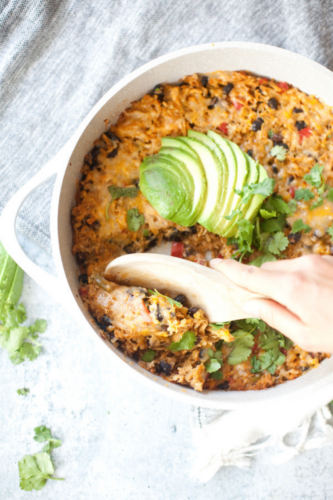 Scoop up my macro-friendly cauliflower rice enchilada skillet. www.lillieeatsandtells.com