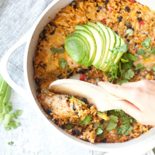 Scoop up my macro-friendly cauliflower rice enchilada skillet. www.lillieeatsandtells.com
