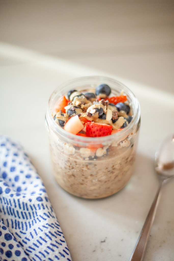 Super filling cauliflower overnight oats with all the toppings in a jar.
