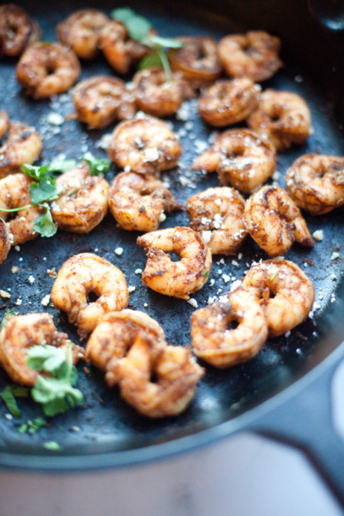 fill your skillet with seasoned spicy shrimp www.lillieeatsandtells.com