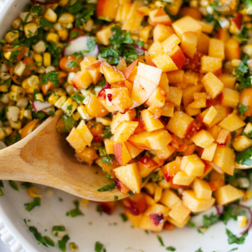 close up of diced peaches in a salad